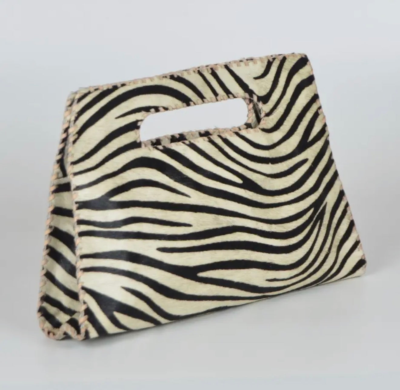 MIA ZEBRA CLUTCH